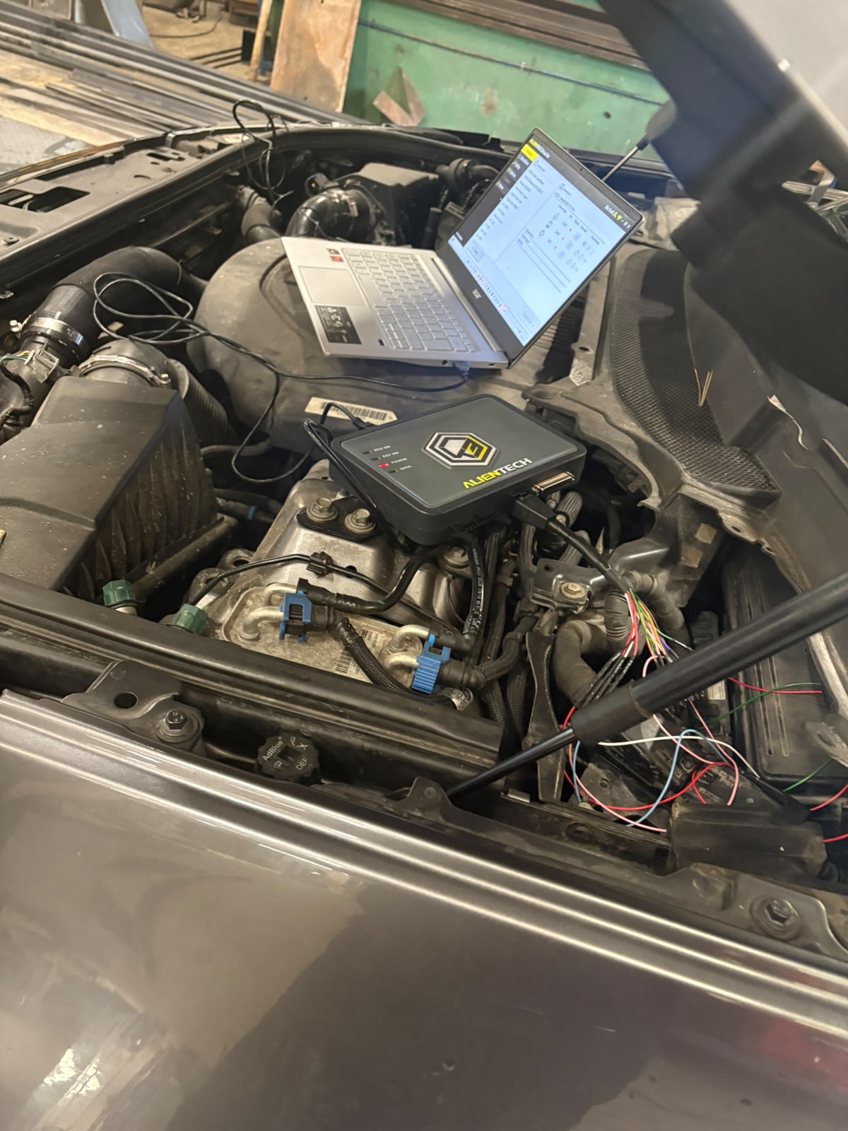 Alientech ECU remapping tool connected to a customer vehicle at Future Remapping, South Wales